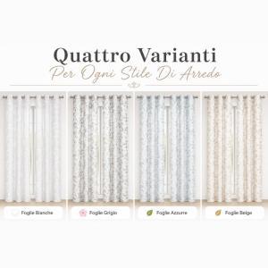 Coppia tende fantasia foglie con 8 anelli 280x290 cm