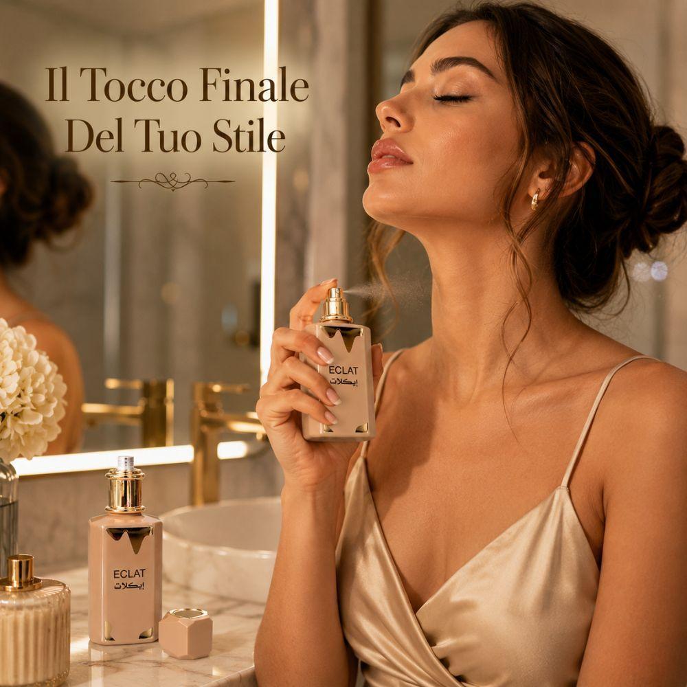 Donna in bagno applica profumo Eclat con testo 'Il Tocco Finale Del Tuo Stile'