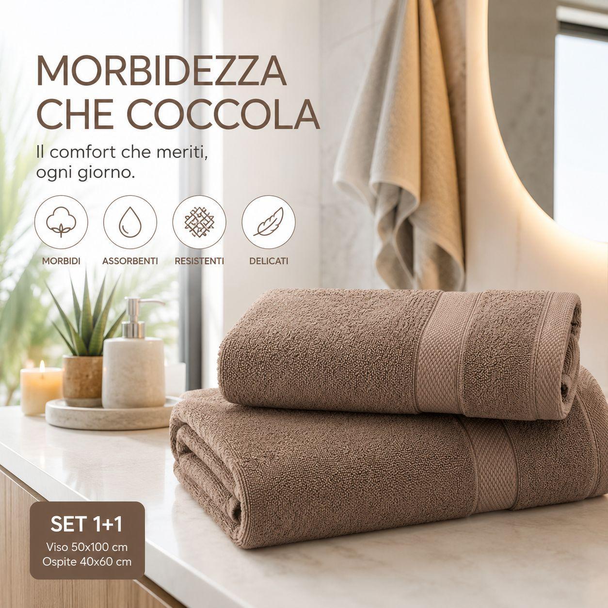 set asciugamani in spugna 2 pezzi viso 50x100 cm ospite 40x60 cm morbidi e assorbenti - foto 2 Due asciugamani in spugna marrone chiaro su tavolo in bagno